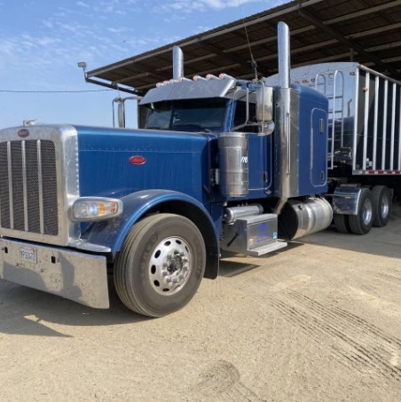 truck leaving the covered barn